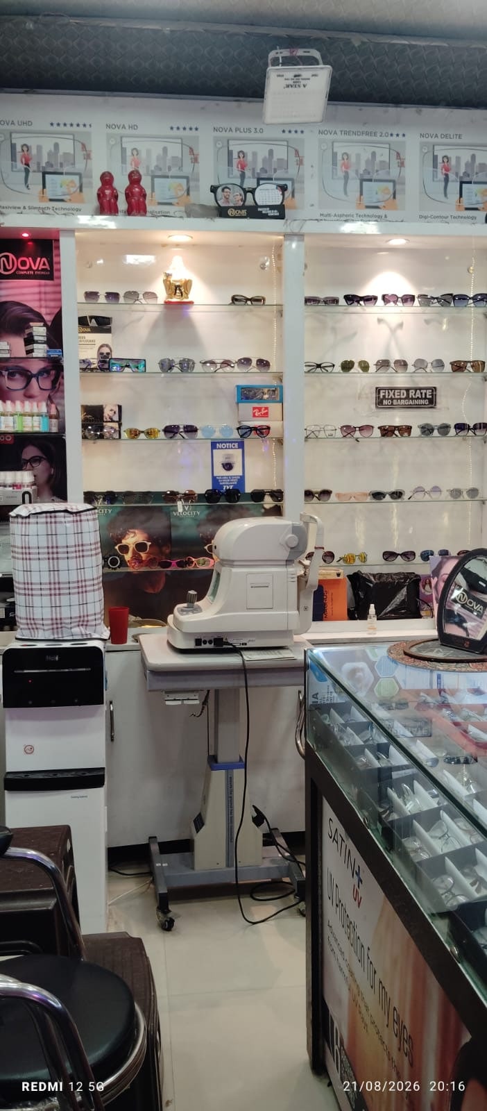 Sunglasses and frames display shelving inside the store